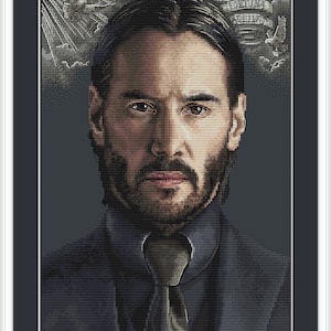 May include: A close-up portrait of a man with a serious expression. He is wearing a dark blue suit jacket and a white shirt with a dark tie. The background is a dark gray with a faint image of doves and clouds. The text "Fortis Fortuna Adiuvat" is visible in the upper right corner of the image.