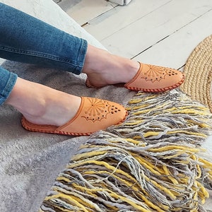 Skin slippers on sale
