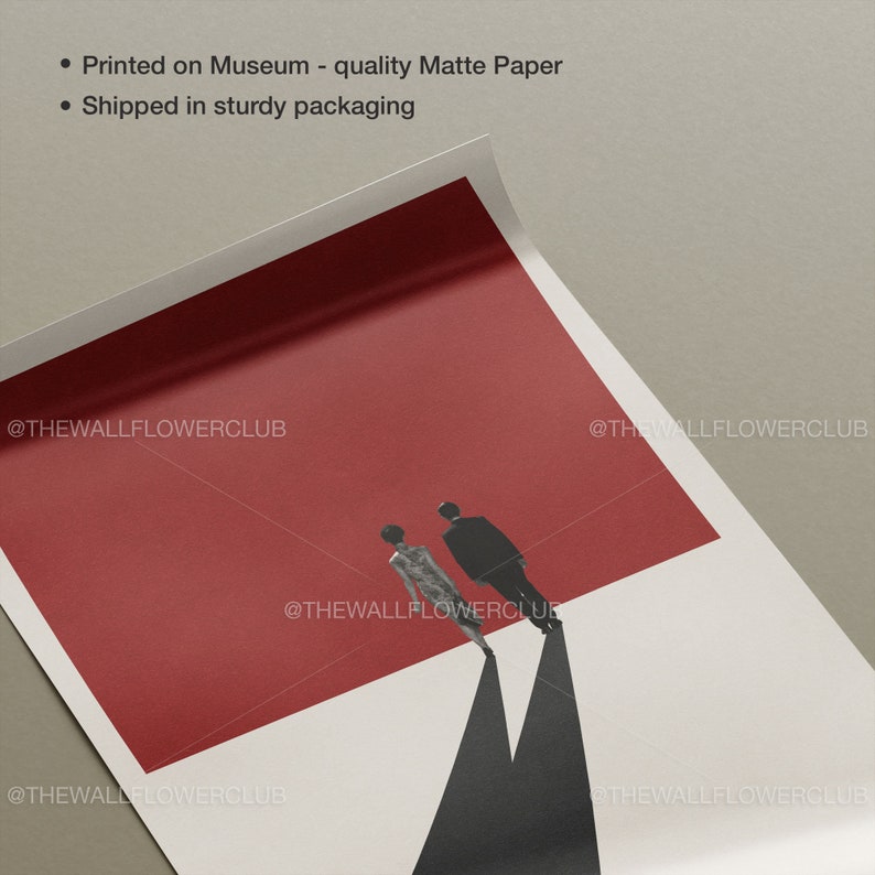 May include: A minimalist art print featuring a red background with two silhouettes of people walking away from each other. The print is titled "The WallFlowerClub".