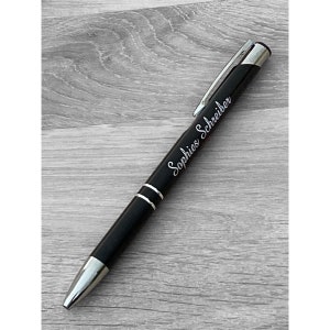 Ballpoint pen with black engraving