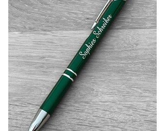 Green ballpoint pen with engraving