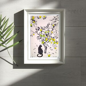 May include: Black and white illustration of a cat sitting under a lemon tree with yellow lemons. The artwork is framed in a white frame.