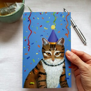 Beautiful card of a cute partying cat. Premium quality 360g folded card for cat lovers