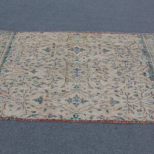 Alfombra turca de 1,95 x 1,10 m (6,4 x 3,6 pies), de lana con lunares azules.