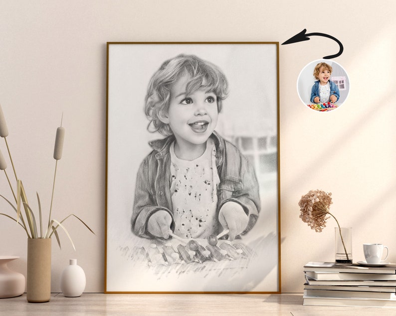 May include: Black and white pencil drawing of a child playing a toy xylophone. The child is smiling and has curly hair. The drawing is framed in a gold frame.
