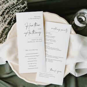 May include: Wedding ceremony program with the names Heather and Anthony, the date August 13, 2022, and the location Middletown, New York. The program lists the officiant, wedding party, and the order of the ceremony.