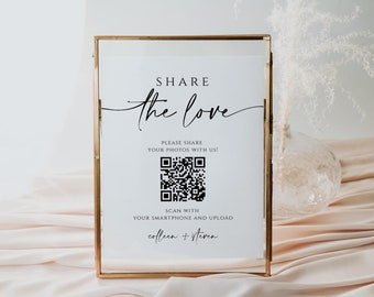 Könnte beinhalten: Ein weißes Schild mit goldenem Rahmen, mit dem Text "SHARE the love" in schwarzer Kursivschrift. Das Schild enthält auch einen QR-Code mit dem Text "PLEASE SHARE YOUR PHOTOS WITH US!" und "SCAN WITH YOUR SMARTPHONE AND UPLOAD Colleen + Steven".