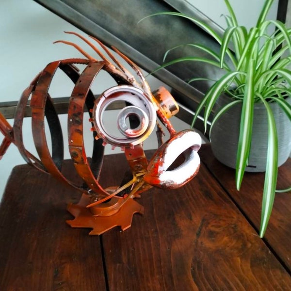 Artwork "ORANJE'" by F-Lor da Fer - Loris Farolfi - recycled iron fish furniture design - sculpture scrap metal art vintage