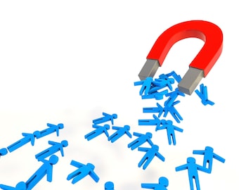May include: A red horseshoe magnet attracts blue stick figures. The magnet is pulling the figures towards it, creating a visual representation of attraction.