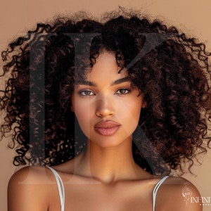 May include: A woman with long, curly brown hair and dark brown eyes. She is wearing a white tank top and has a neutral expression on her face.