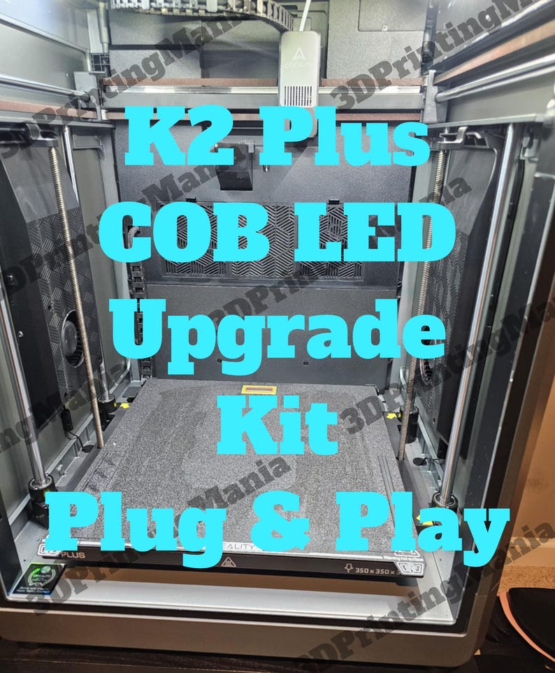 May include: A close-up of a 3D printer with a black and gray build plate. The printer is labeled "K2 Plus COB LED Upgrade Kit Plug & Play".