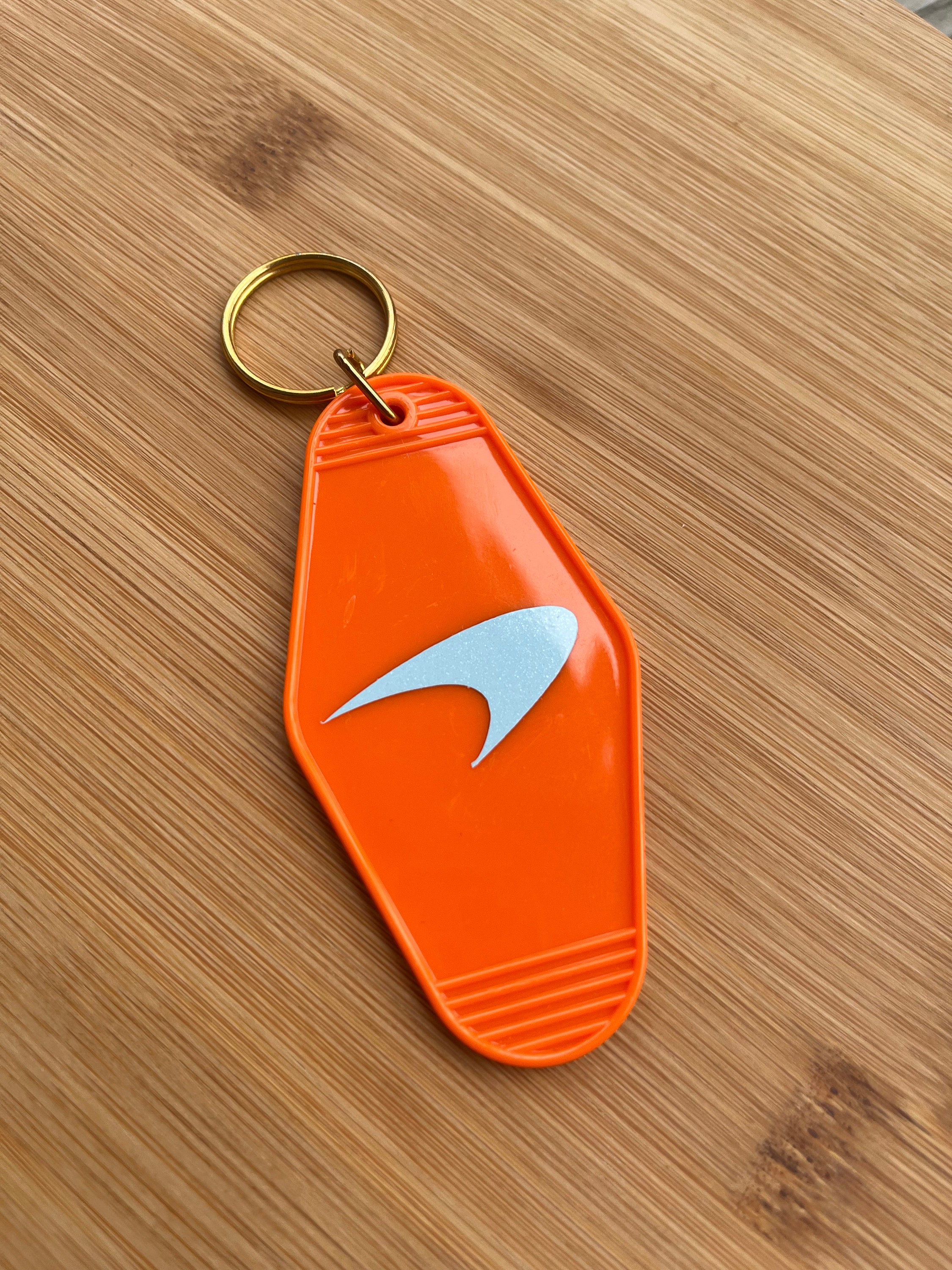 Orange nike keychain discount