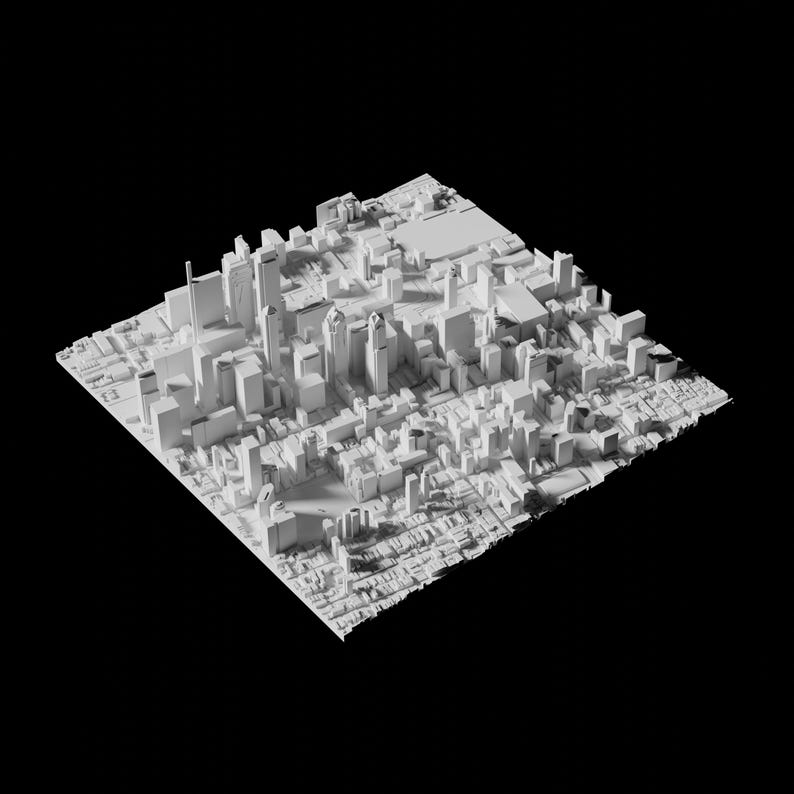 May include: A white 3D model of a city skyline with tall buildings and smaller buildings surrounding them.