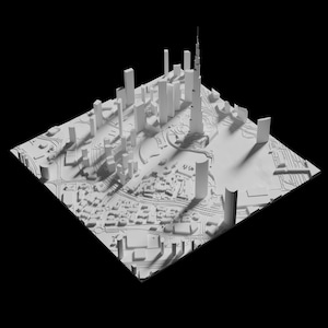 Puede incluir: Un modelo 3D blanco de un horizonte de ciudad con edificios altos y una gran torre central. El modelo est&aacute; sobre un fondo negro.