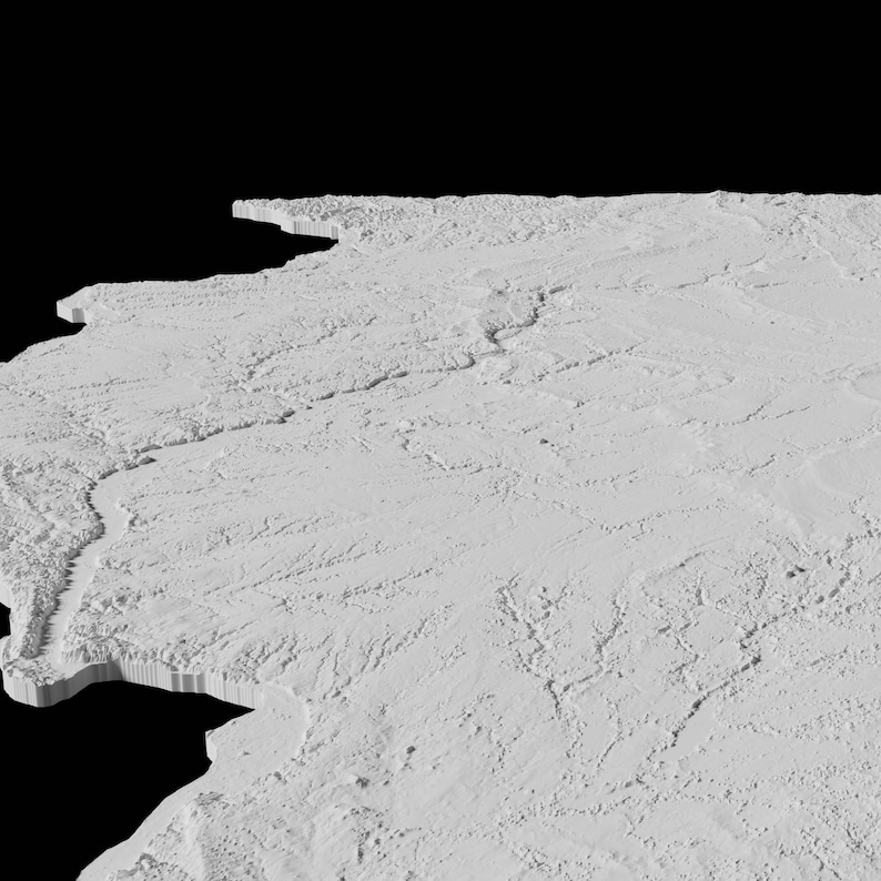 May include: A 3D printed model of a landscape with a river running through it. The model is made of white plastic and has a textured surface.