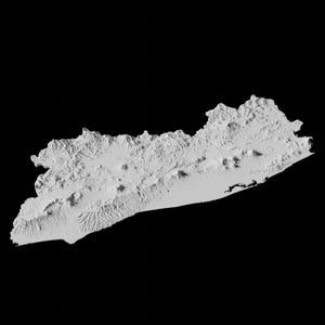 May include: A 3D rendering of a mountainous region, likely a country or state, with a coastline on the right side. The terrain is depicted in shades of grey, highlighting the peaks and valleys.