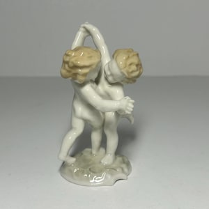 HUTSCHENREUTHER Germany Porcelain Figurine