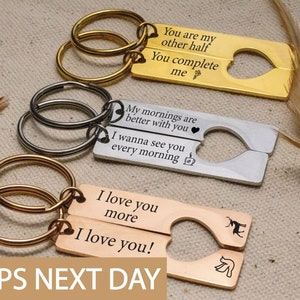 May include: Three sets of matching keychains with engraved messages. The keychains are made of gold, silver, and copper metal. The messages on the keychains are "You are my other half You complete me", "My mornings are better with you I wanna see you every morning", and "I love you more I love you!"