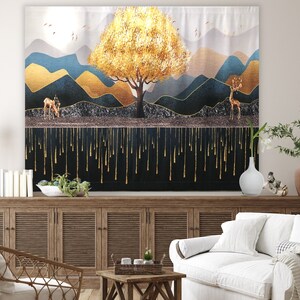 May include: A tapestry featuring a gold and black abstract landscape with a golden tree and two deer. The background is a dark blue and gold color with a dripping gold effect.