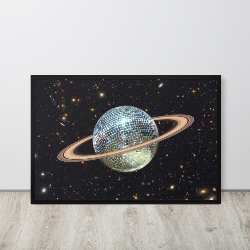 May include: A disco ball planet with a ring system in a dark space background with stars.