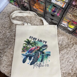 Christian beach lover 12”x14” canvas tote bag. “Stay Salty” with sea turtle - Matthew 5:13