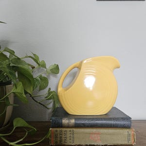 Vintage Fiestaware 6" yellow juice pitcher