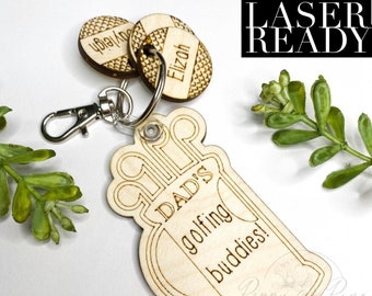 May include: Laser cut wooden keychain shaped like a golf bag with the text "Dad's golfing buddies!"  Two additional round wooden tags with the text "Elijah" and "Audrey" are attached to the keychain.