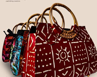 May include: A set of four colourful tote bags with woven handles. The bags are made of fabric with a geometric pattern and feature a sun design. The bags are arranged in a row, with the largest bag at the front.