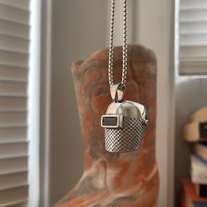 Welding hood pendant with chain