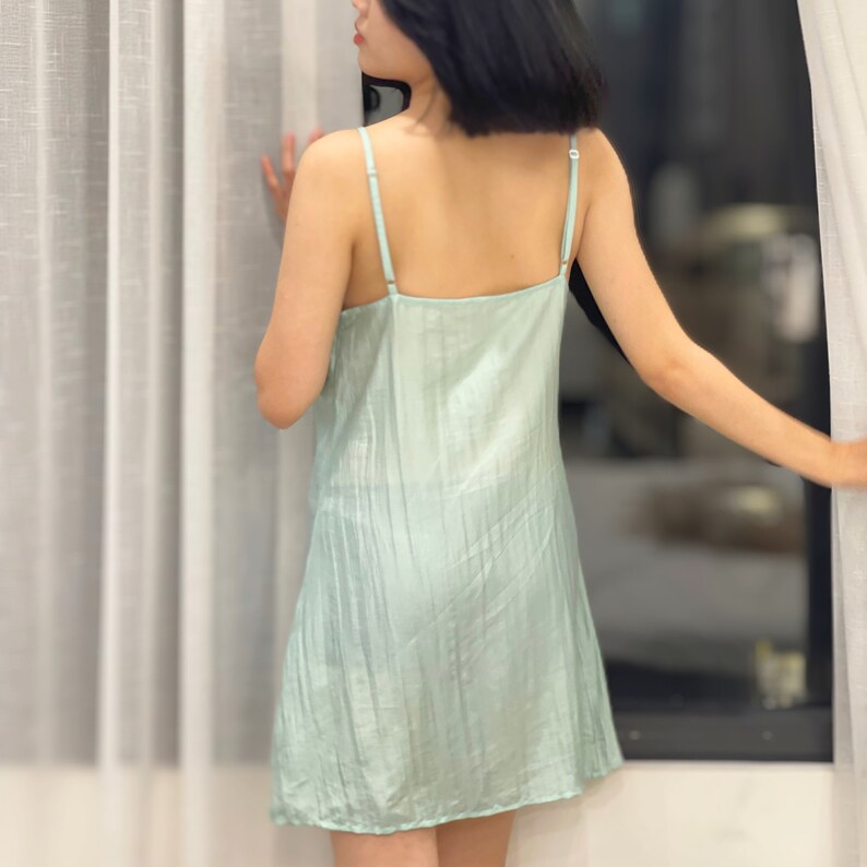 Silk short (mini) dress with adjustable straps.