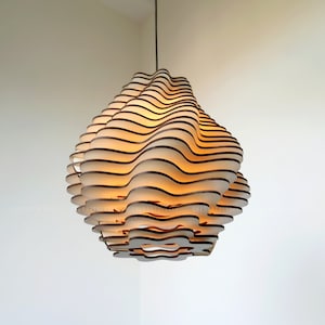 This versatile ceiling lighting fixture, meticulously handcrafted from premium plywood, brings a unique geometric focal point to your kitchen island, dining room, bedroom, living room, entryway, staircase, and even in a chic coffee shop setting.