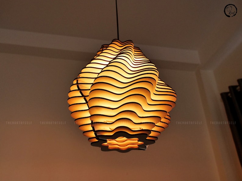 Illuminate your home with our exquisite Wood Pendant Light, a captivating fusion of Mid Century Modern, Scandinavian, Nordic, and Minimalist design.