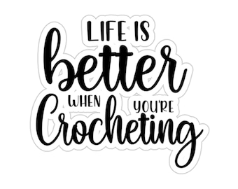 May include: Black and white text graphic that reads "Life is better when you're crocheting".