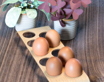 Expositor de huevos de madera, elegante y único. Diseño original, refinado y sobrio. Estaca estaca. Decora tu cocina