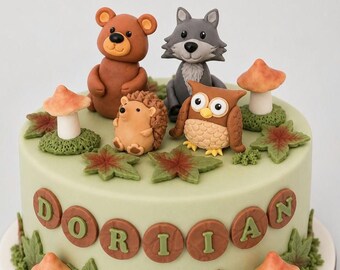 May include: A light green cake decorated with woodland animal figurines, including a bear, wolf, owl, and hedgehog. The cake is adorned with mushrooms, leaves, and the name "Dorian" in brown letters. The cake is round.