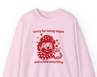 Funny Clowncore Sweatshirt: "Sorry For Being Vague" Meme Pullover