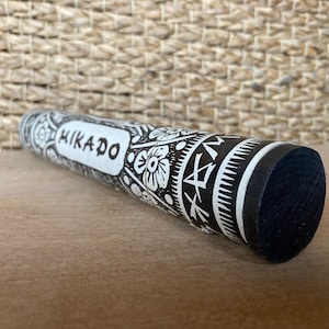 Juego de Mikado vintage, piezas de madera, elegante embalaje cilíndrico, cartón y madera forrados con papel decorado, adjunto instrucciones.