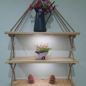 wooden wall shelf with wicker rope