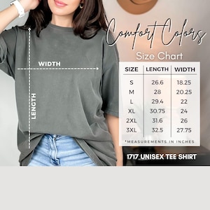 May include: A gray unisex tee shirt with a size chart showing length and width measurements in inches. The shirt is labeled "1717 Unisex Tee Shirt" and the size chart is for Comfort Colors shirts.