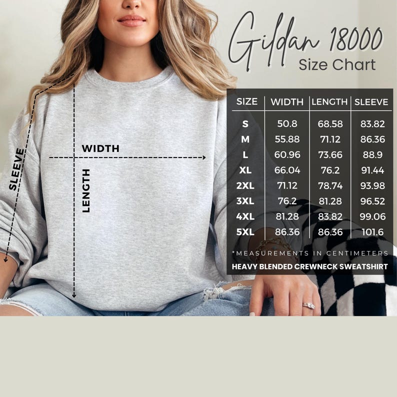 May include: A light gray crewneck sweatshirt with a size chart. The chart displays measurements in centimeters for width, length, and sleeve length, ranging from size S to 5XL. The text "Gildan 18000" is visible.