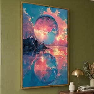 May include: A framed wall art print featuring a surreal landscape with a large, glowing spherical orb suspended in a sky filled with pink, orange, and blue clouds above a dark mountain range and a calm, reflective body of water.