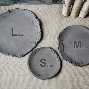 May include: Three gray ceramic plates of different sizes, labeled "L size", "M size", and "S size".