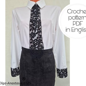 May include: A white collared shirt with a black crochet tie, cuffs, and a matching belt detail. The image includes the text "Crochet pattern PDF in English". The design features floral patterns.