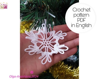 May include: White crocheted snowflake ornament hanging on a Christmas tree. Crochet pattern PDF in English.