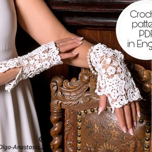 May include: White, open-work crochet gloves with a floral design. The gloves are worn on a person's hands, with the text "Crochet pattern PDF in English" in a white circle. The gloves are a delicate, lacy design.