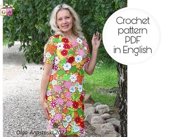 May include: A crochet dress pattern in PDF format, written in English. The dress is made with colorful flowers and leaves.