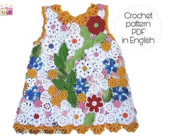 May include: A crochet pattern for a white dress with colorful flowers and leaves. The pattern is available as a PDF download in English.