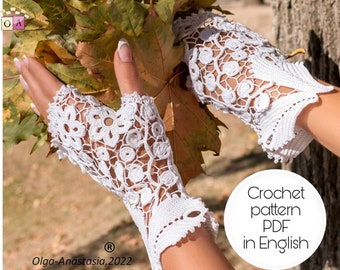 May include: White crochet fingerless gloves with a delicate floral pattern. Crochet pattern PDF in English.
