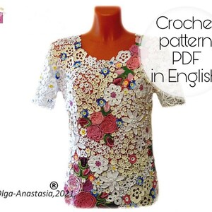 Puede incluir: Patr&oacute;n de ganchillo PDF en ingl&eacute;s para un top de ganchillo blanco con flores de colores. El top est&aacute; en un maniqu&iacute;.