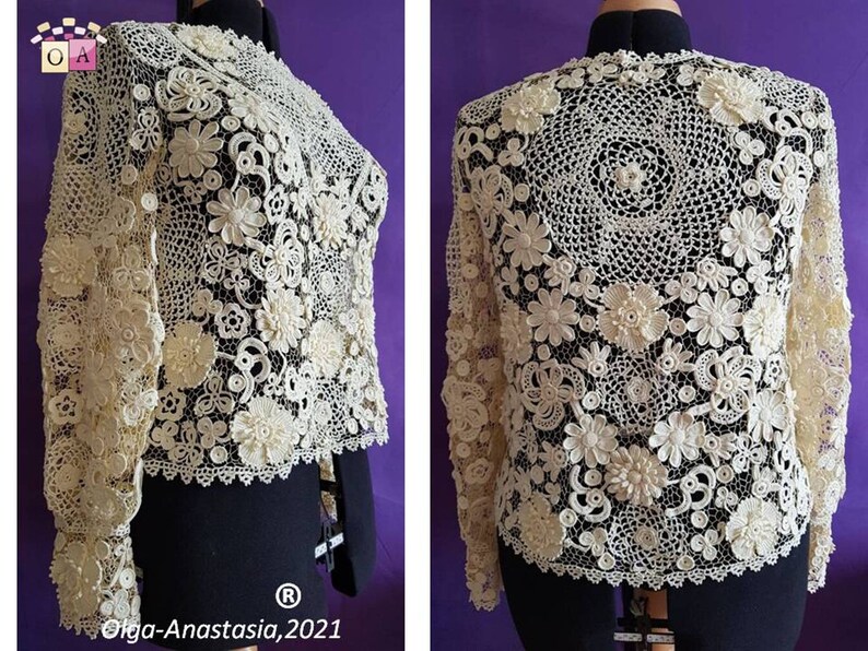 May include: A white crocheted top with long sleeves and a delicate floral design. The top is made with intricate crochet stitches and features a variety of flower shapes.